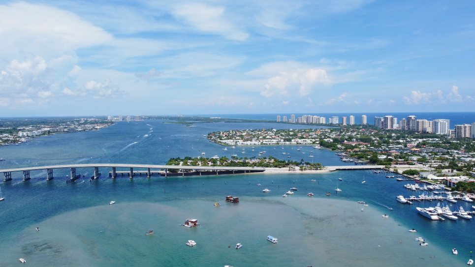 The Blue Heron Bridge and the Riviera Beach waterfront from the air, boats on the Lake Worth Lagoon